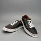 Roamers Audrey black leather sneaker with silver metallic trim, side zipper, and white rubber outsole.
photo of the front side