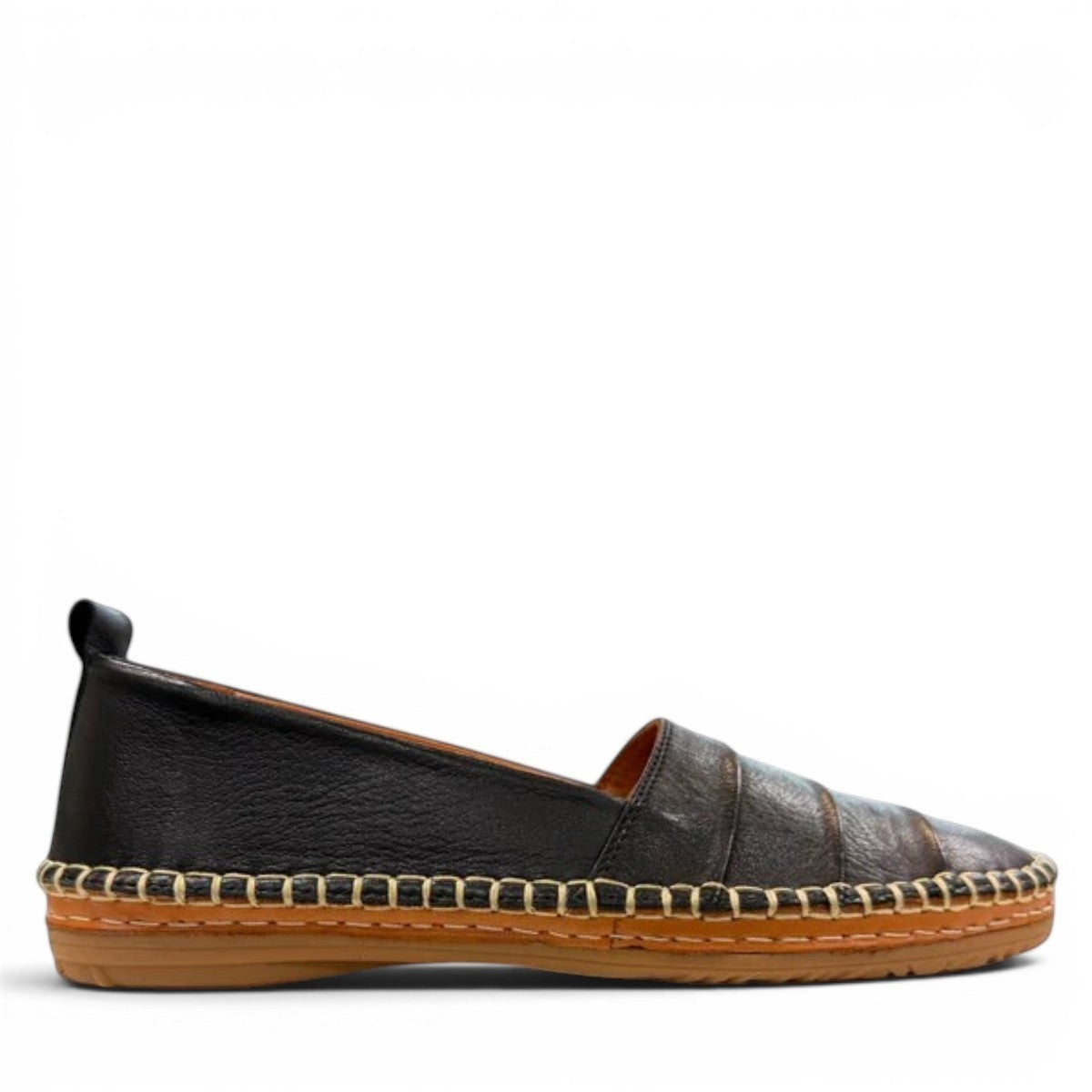 Roamers Avery black leather flat with decorative whipstitch detailing and a durable rubber sole.
photo of the right side