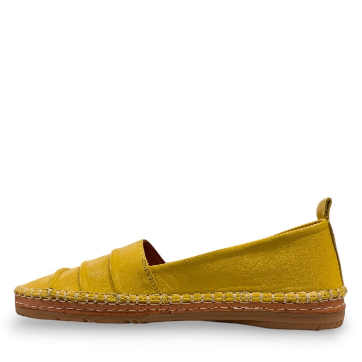 Roamers Avery yellow leather flat with cutout details and stitched rubber sole, side view.
photo of the left side