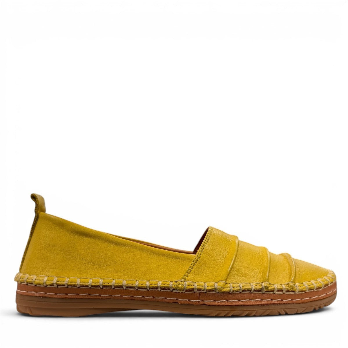 Roamers Avery yellow leather flat with cutout details and stitched rubber sole, side view.
photo of the right side
