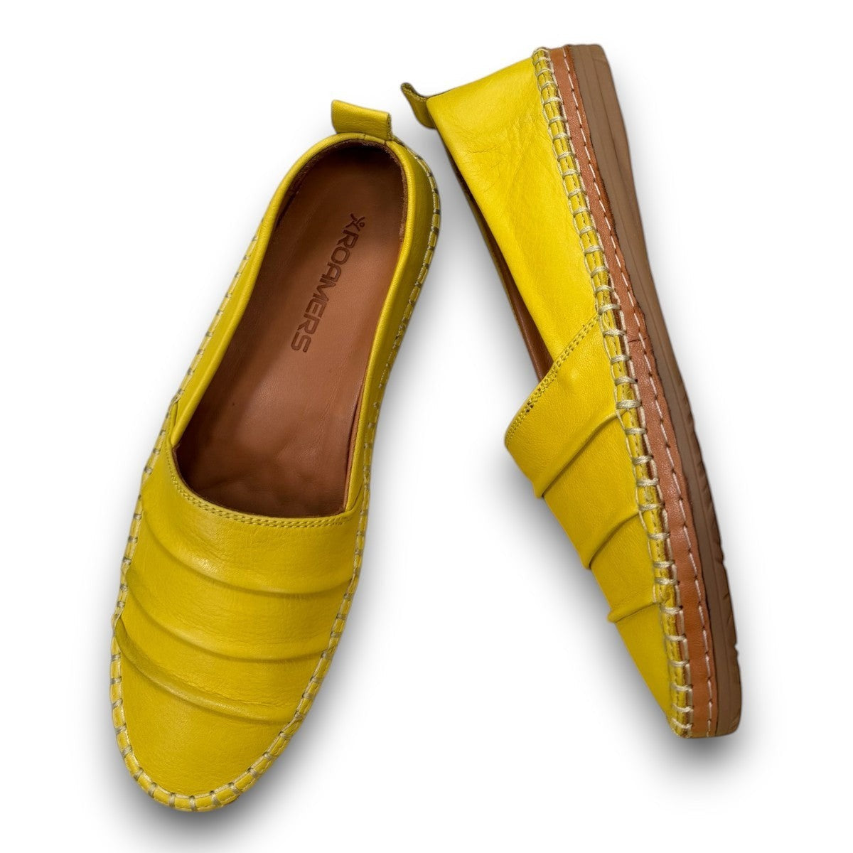 Roamers Avery yellow leather flat with cutout details and stitched rubber sole, side view.
photo of the top side