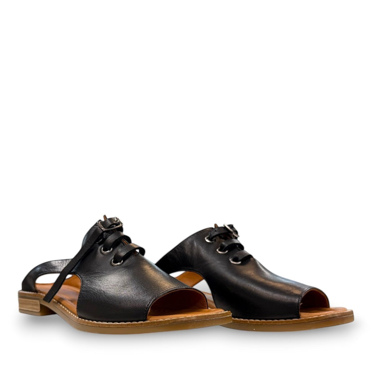 Roamers Whitney black leather backless sandal with lace-up detail and low rubber heel.
photo of the front side