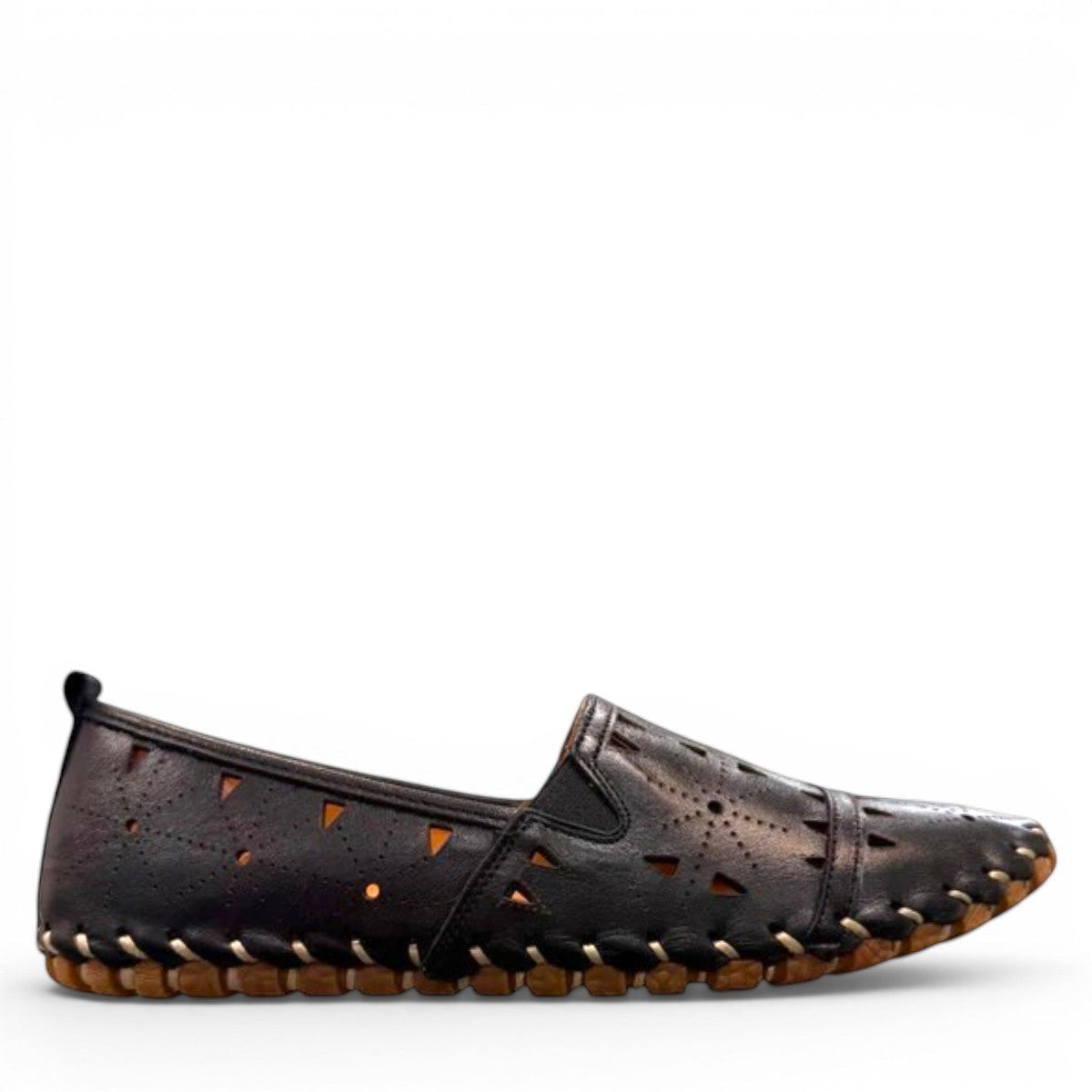 roamers black leather slip-on loafer with geometric laser cutouts, artisan stitching, and flexible rubber sole.
photo of the right side