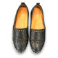 roamers black leather slip-on loafer with geometric laser cutouts, artisan stitching, and flexible rubber sole.
photo of the top side
