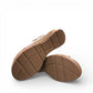 Roamers Eden white leather wedge sandal with brown lace-up detail and side zipper entry.
photo of the bottom side