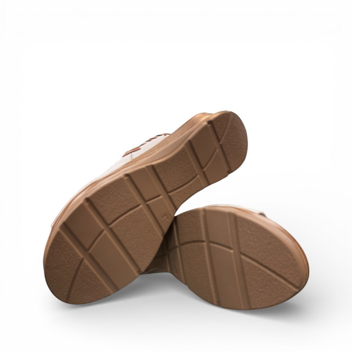 Roamers Eden white leather wedge sandal with brown lace-up detail and side zipper entry.
photo of the bottom side
