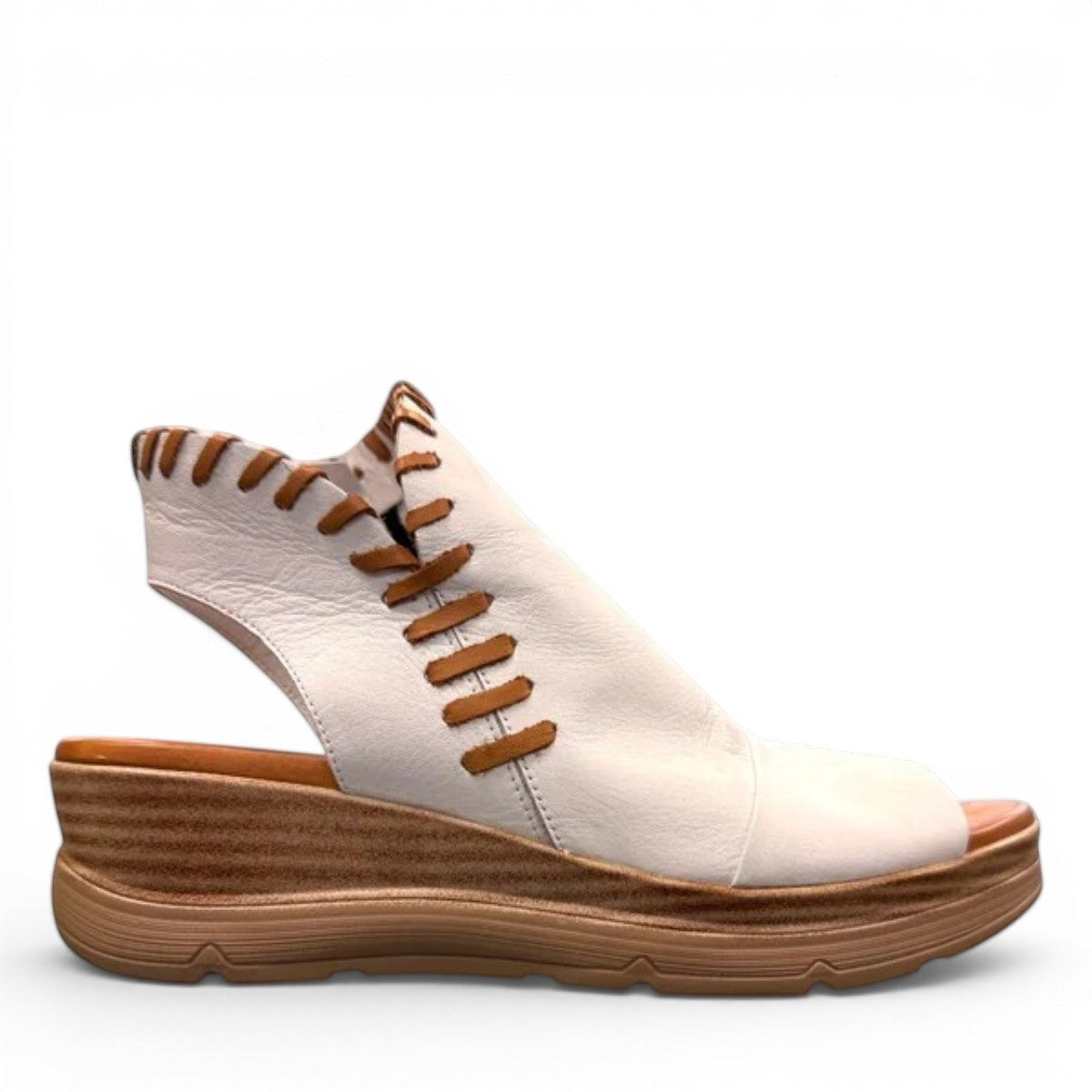 Roamers Eden white leather wedge sandal with brown lace-up detail and side zipper entry.
photo of the