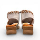 Roamers Eden white leather wedge sandal with brown lace-up detail and side zipper entry.
photo of the back side