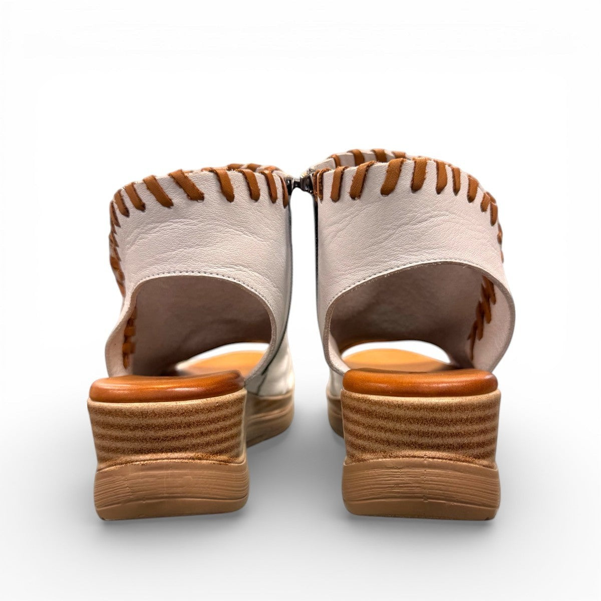Roamers Eden white leather wedge sandal with brown lace-up detail and side zipper entry.
photo of the back side