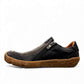 Roamers Enid black leather slip-on shoe with contrast stitching and a textured brown rubber sole.
photo of the left side