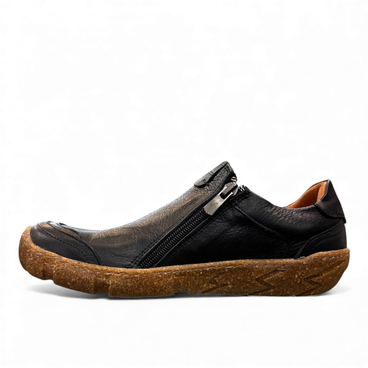 Roamers Enid black leather slip-on shoe with contrast stitching and a textured brown rubber sole.
photo of the left side