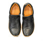 Roamers Enid black leather slip-on shoe with contrast stitching and a textured brown rubber sole.
photo of the top side