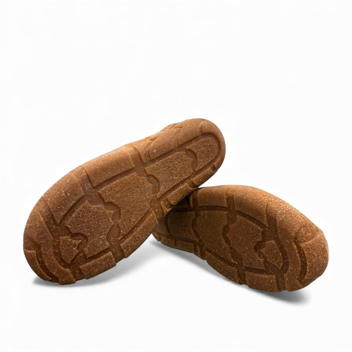 Roamers Enid black leather slip-on shoe with contrast stitching and a textured brown rubber sole.
photo of the bottom side
