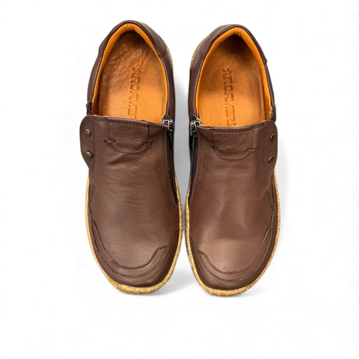 Roamers Enid brown leather slip-on shoes with contrast stitching and a textured rubber sole.
photo of the top side
