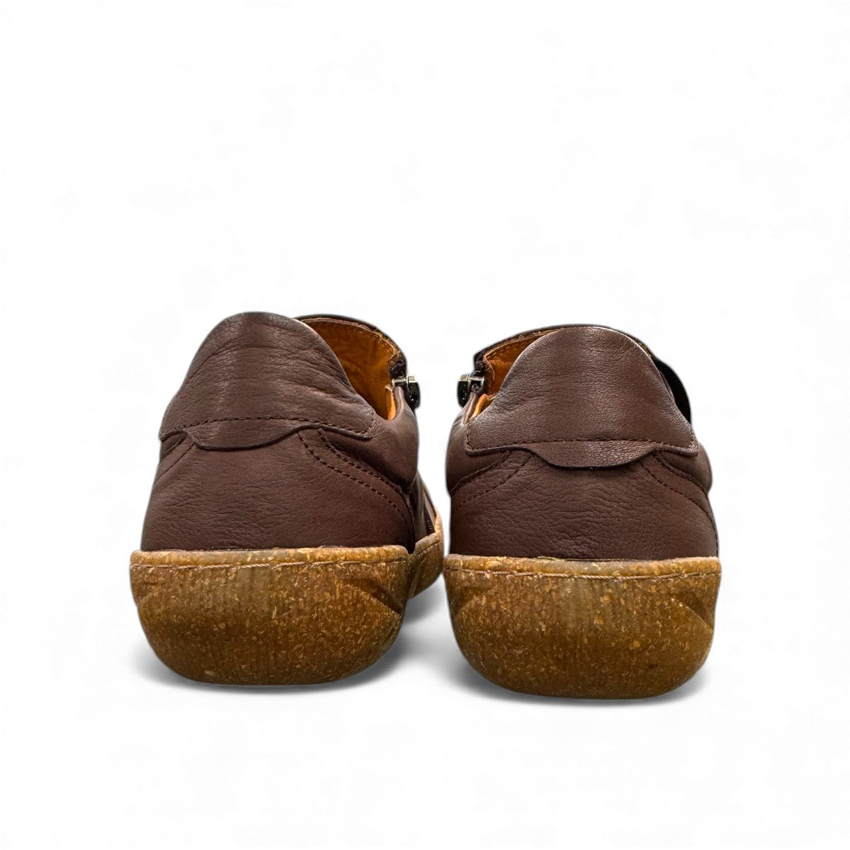 Roamers Enid brown leather slip-on shoes with contrast stitching and a textured rubber sole.
photo of the back side