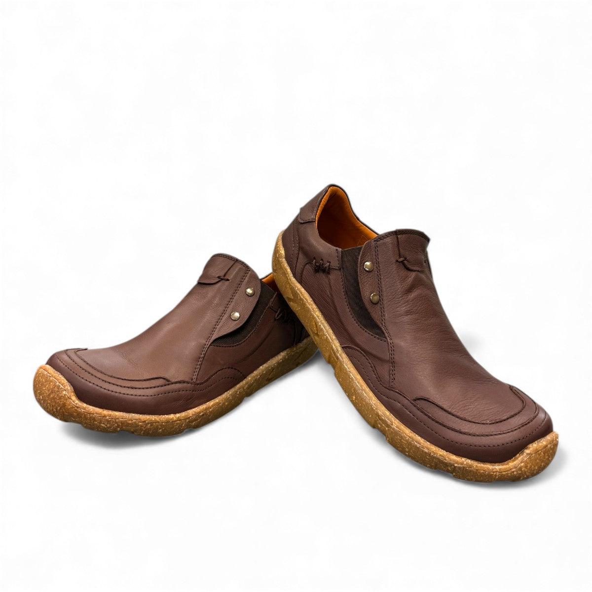 Roamers Enid brown leather slip-on shoes with contrast stitching and a textured rubber sole.
photo of the front side