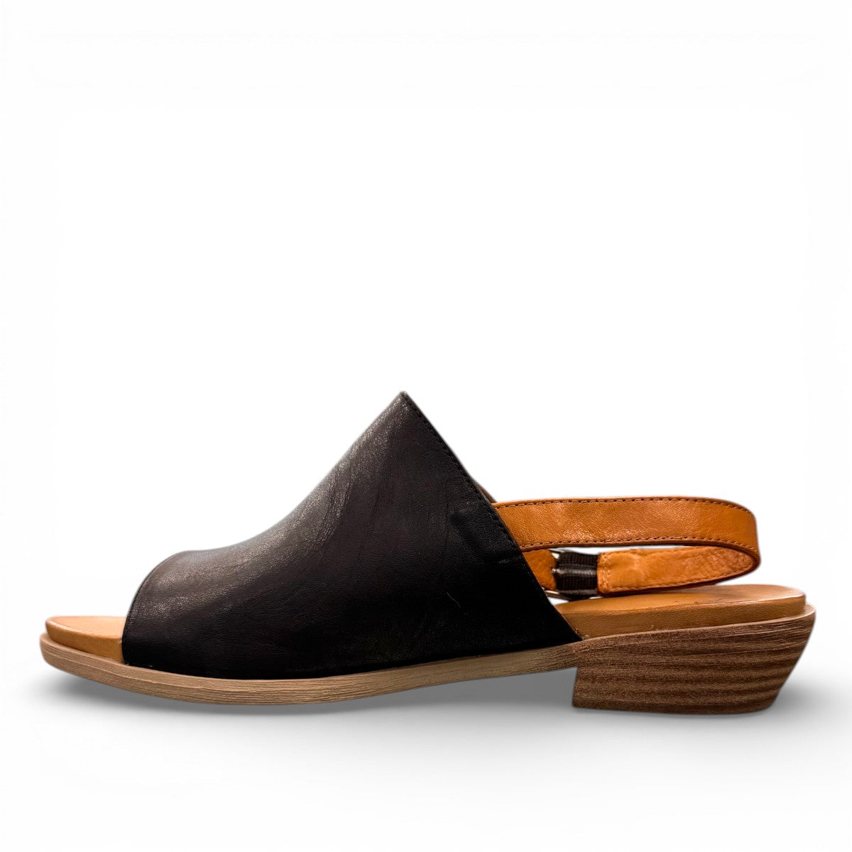 Roamers Jude low heel sandal in black and tan leather with a side buckle and open toe design.
photo of the left side