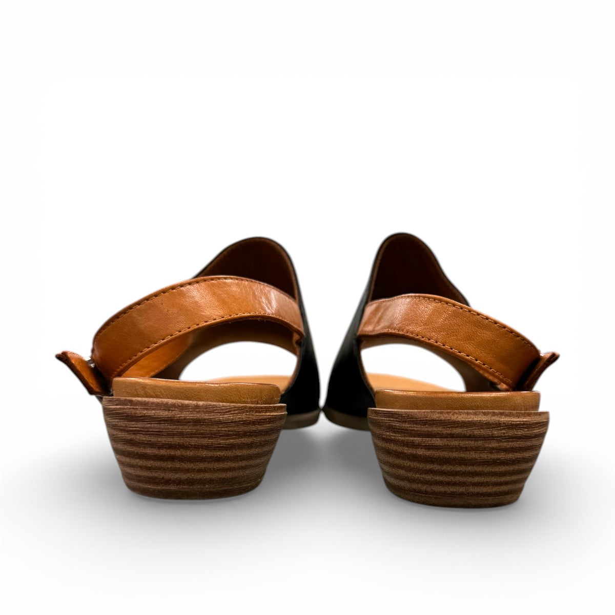Roamers Jude low heel sandal in black and tan leather with a side buckle and open toe design.
photo of the back side