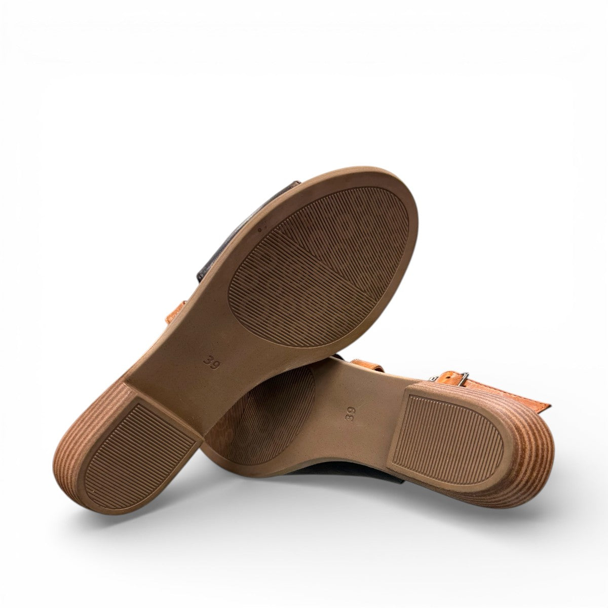 Roamers Jude low heel sandal in black and tan leather with a side buckle and open toe design.
photo of the bottom side