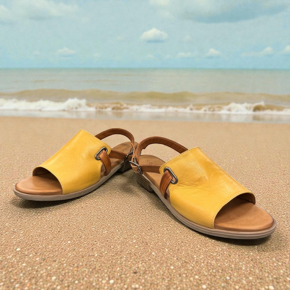 Roamers Jude low heel sandal in yellow and brown leather with a side buckle strap.
photo of the front side