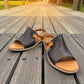 Roamers Jude low heel sandal in black and tan leather with a side buckle and open toe design.
photo of the front side