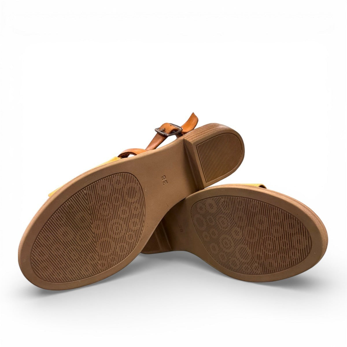 Roamers Jude low heel sandal in yellow and brown leather with a side buckle strap.
photo of the bottom side