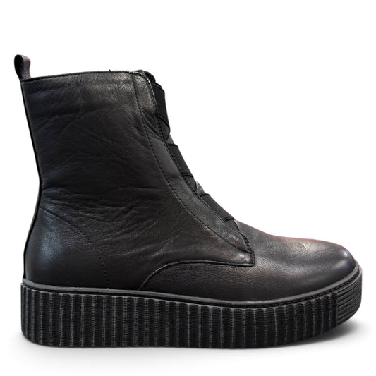 Roamers Kennedy black leather ankle boot with a thick ribbed rubber platform sole and side zipper.