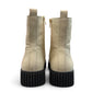 Roamers Kennedy cream leather ankle boots with a black rubber platform outsole and side zipper entry.