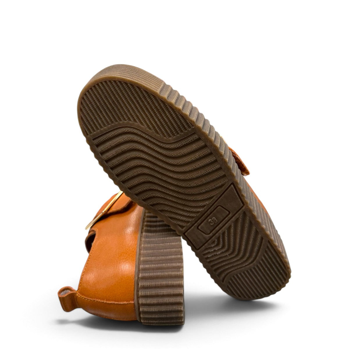 Roamers Khloe tan leather loafer with a gold buckle and thick ribbed platform sole, side view.