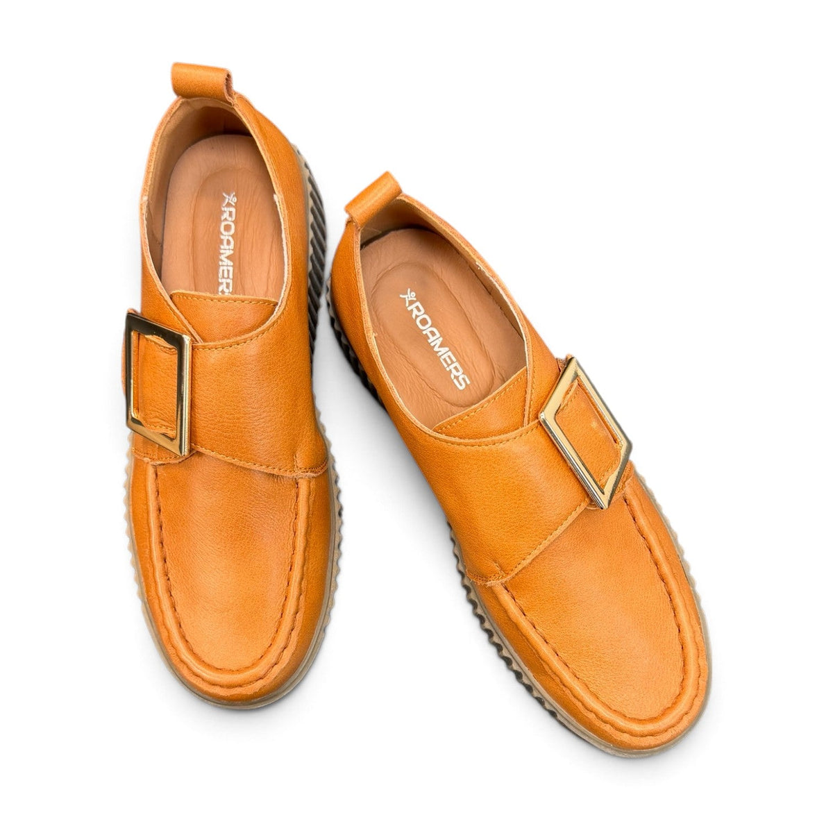 Roamers Khloe tan leather loafer with a gold buckle and thick ribbed platform sole, side view.