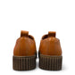 Roamers Khloe tan leather loafer with a gold buckle and thick ribbed platform sole, side view.