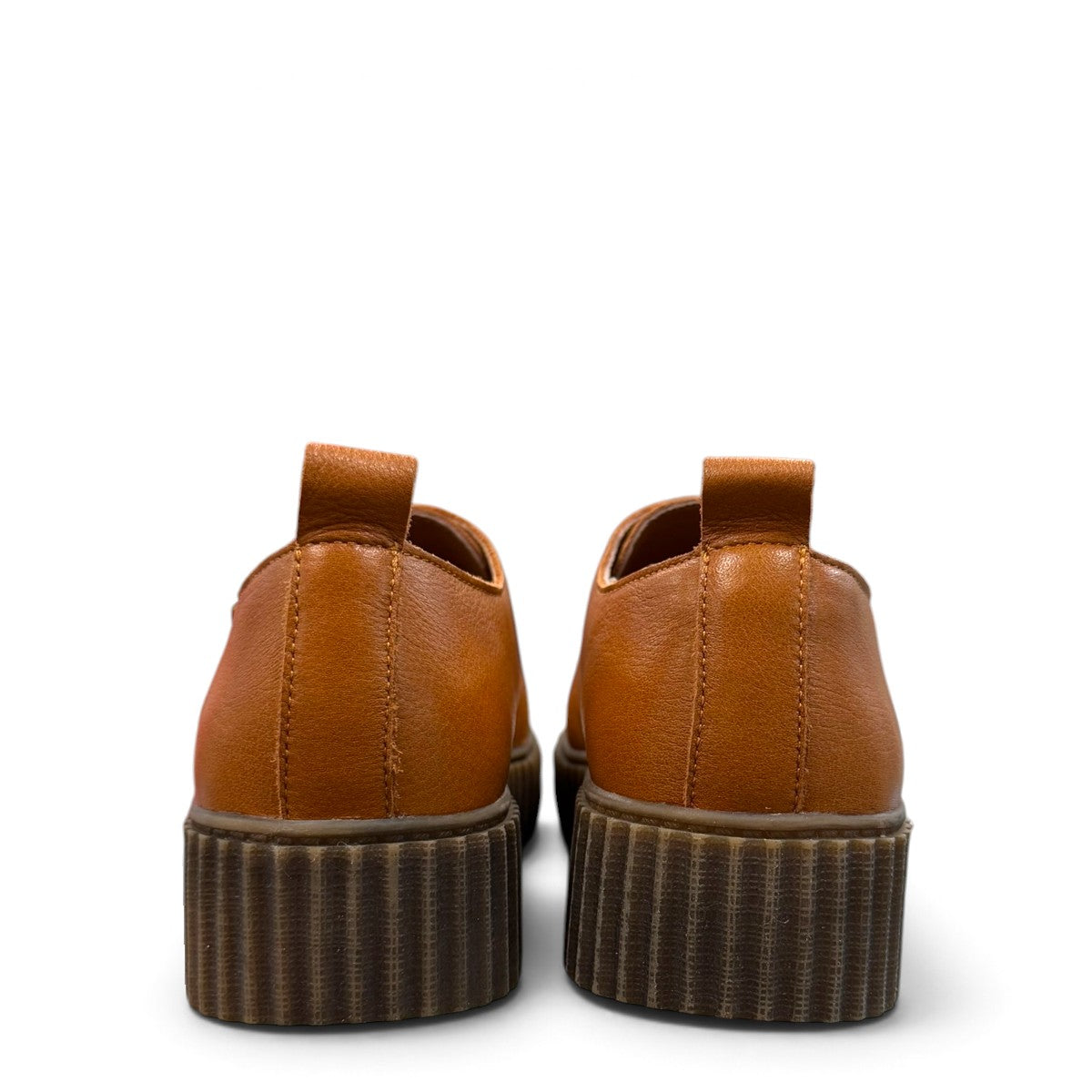 Roamers Khloe tan leather loafer with a gold buckle and thick ribbed platform sole, side view.