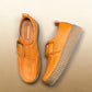 Roamers Khloe tan leather loafer with a gold buckle and thick ribbed platform sole, side view.