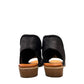 Roamers Maddison black leather open-toe sandal with a low wooden heel and comfortable footbed.
photo of the back side