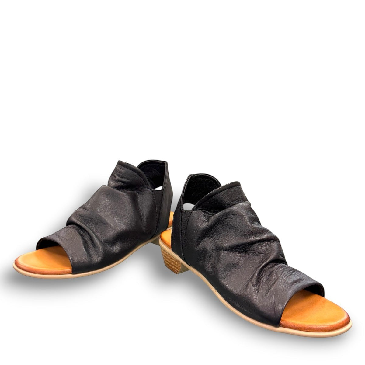 Roamers Maddison black leather open-toe sandal with a low wooden heel and comfortable footbed.
photo of the front side