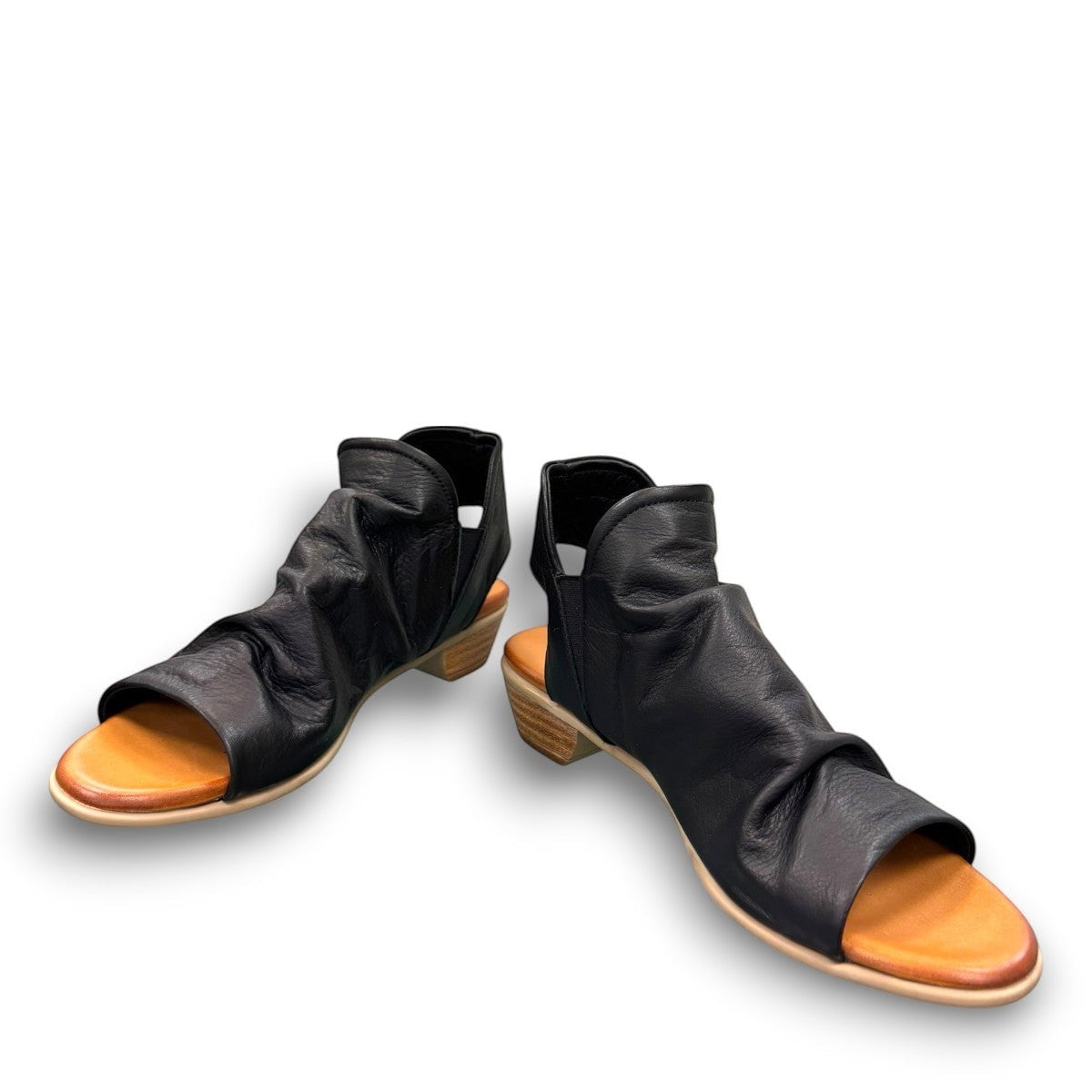Roamers Maddison black leather open-toe sandal with a low wooden heel and comfortable footbed.
photo of the front side