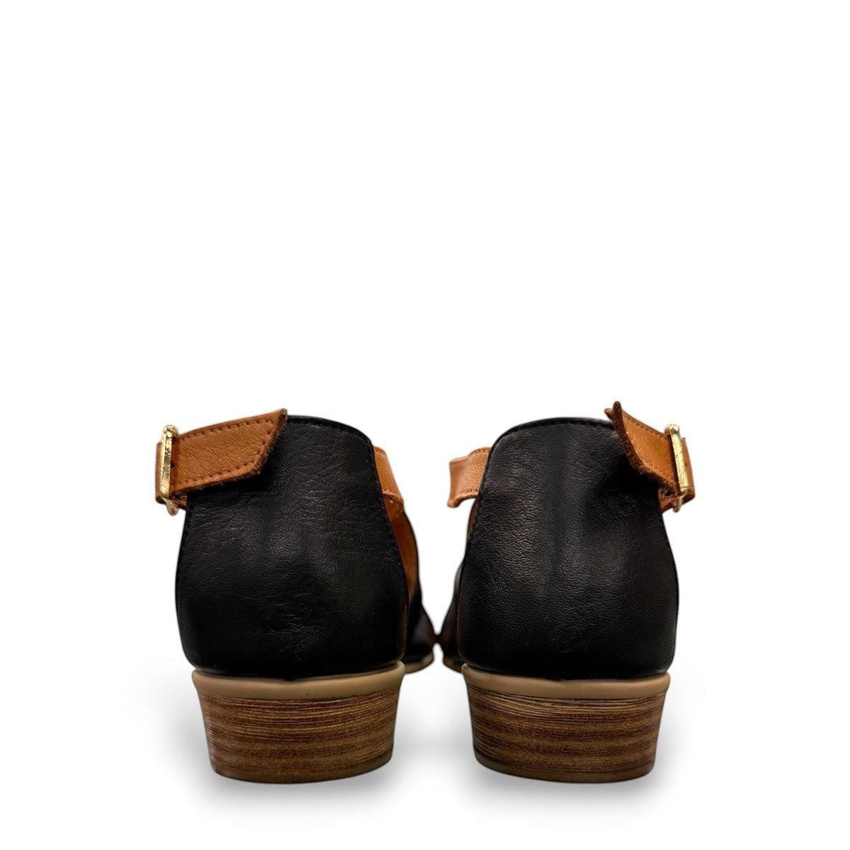 Roamers Mae black and tan leather sandals with side buckle and low block heel.
photo of the back side