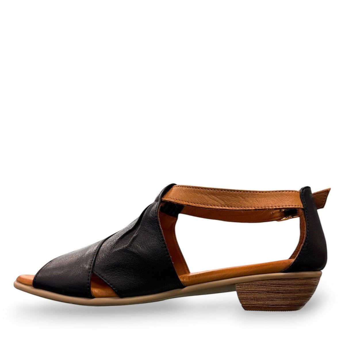 Roamers Mae black and tan leather sandals with side buckle and low block heel.
photo of the left side