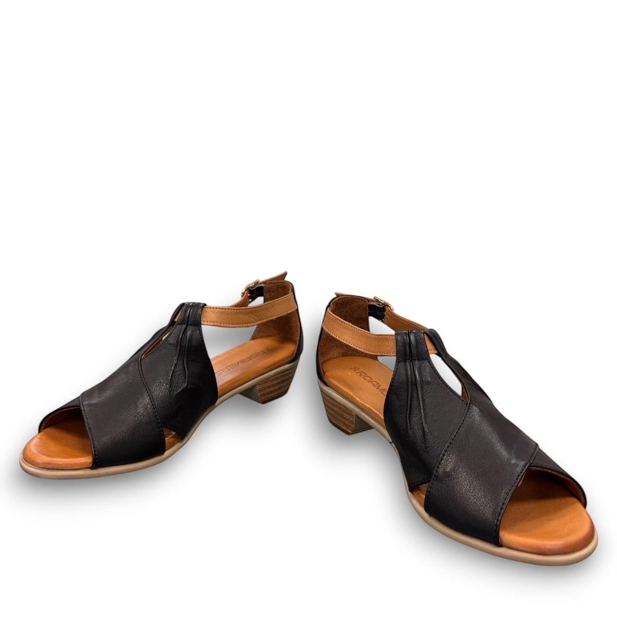 Roamers Mae black and tan leather sandals with side buckle and low block heel.
photo of the front side