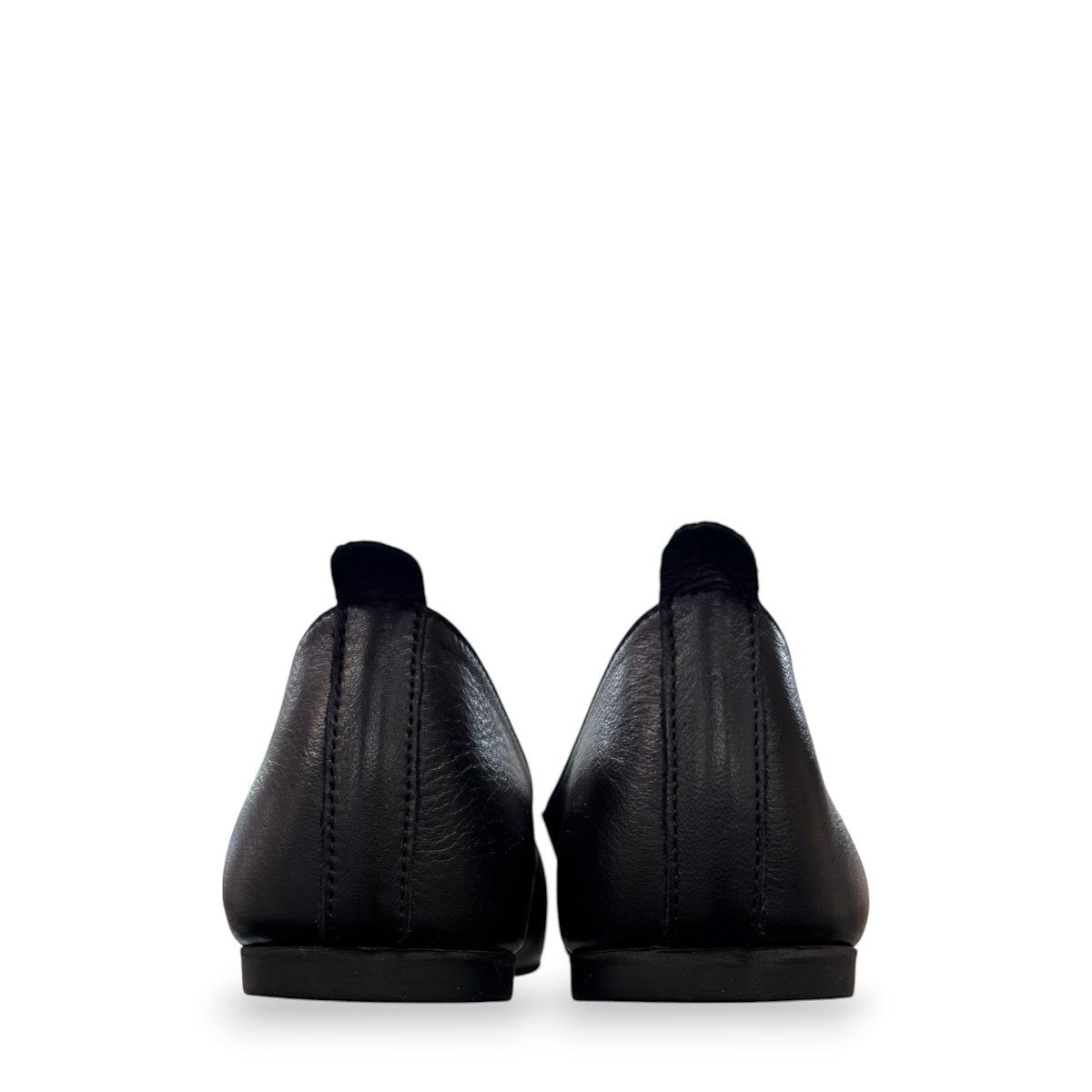 Roamers Malia black leather slip-on ballet flat with soft upper and minimalist design.
photo of the back side
