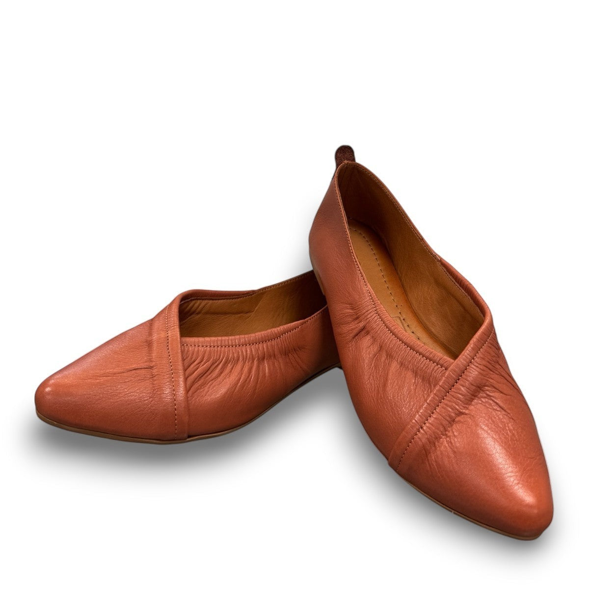 Roamers Malia mahogany brown leather ballet flats with a soft slip-on design and gathered detail.
photo of the front side