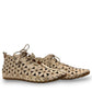 Roamers Venus mink leather ankle boots featuring a decorative floral cutout pattern and elastic lacing.
photo of the side