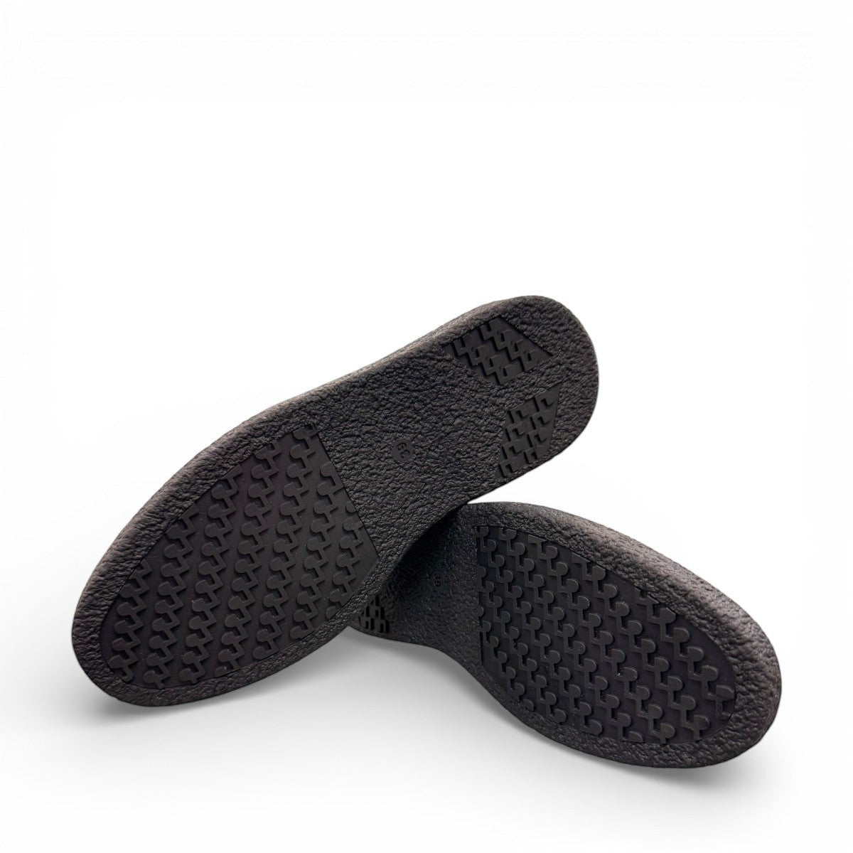 ROAMERS NILA black metallic leather loafer with a platform sole and saddle strap detail.
photo of the bottom side