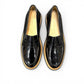 ROAMERS NILA black metallic leather loafer with a platform sole and saddle strap detail.
photo of the top side