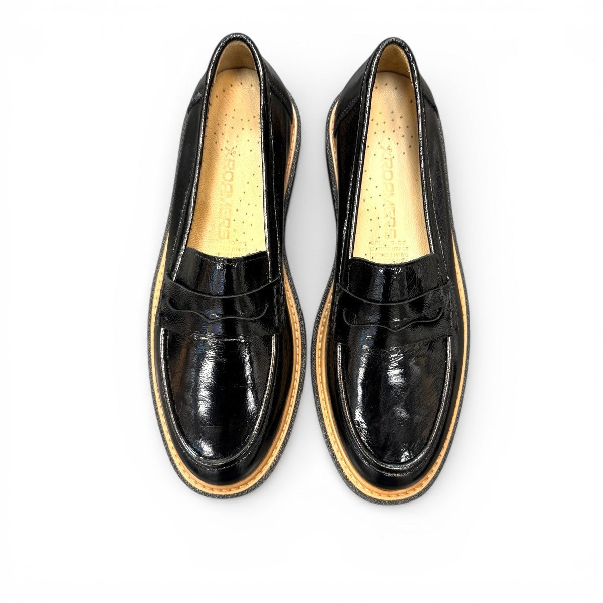 ROAMERS NILA black metallic leather loafer with a platform sole and saddle strap detail.
photo of the top side