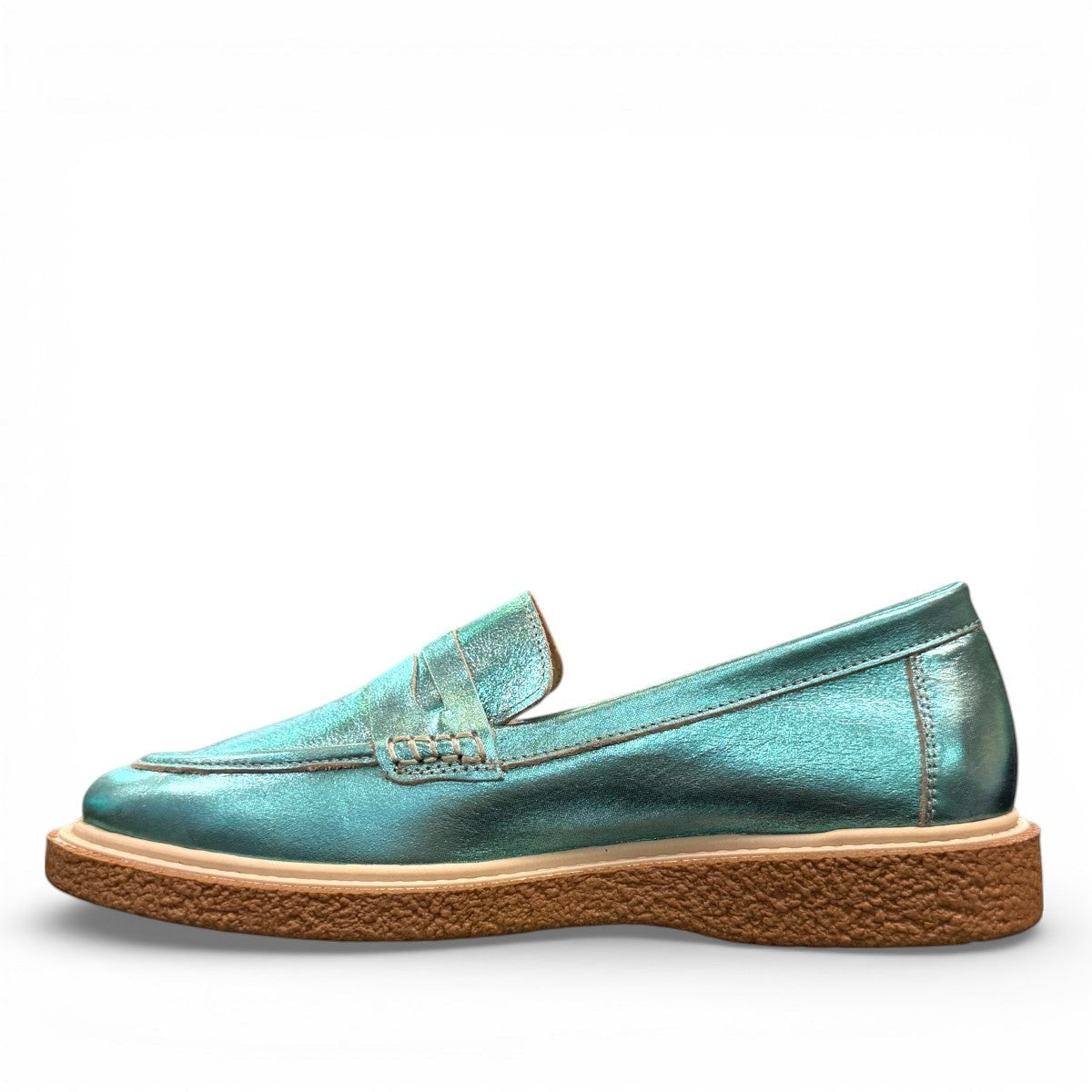 Roamers Nila metallic teal leather loafer with a brown platform sole and moccasin-style stitching.
photo of the left side