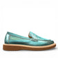 Roamers Nila metallic teal leather loafer with a brown platform sole and moccasin-style stitching.
photo of the right side