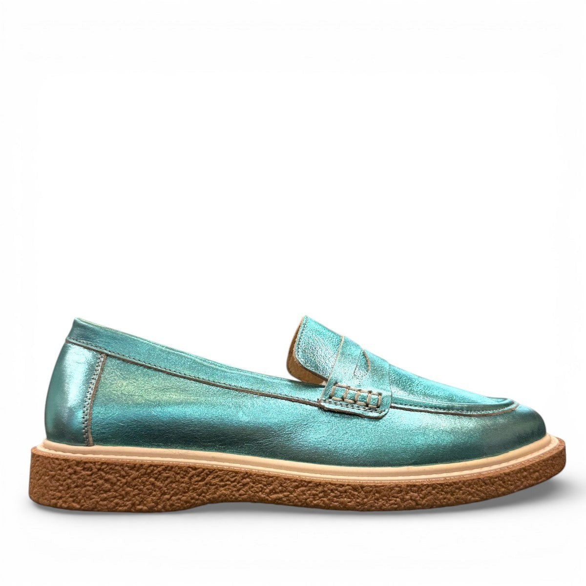 Roamers Nila metallic teal leather loafer with a brown platform sole and moccasin-style stitching.
photo of the right side