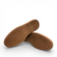 Roamers Nila metallic teal leather loafer with a brown platform sole and moccasin-style stitching.
photo of the bottom side