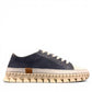 ROAMERS PARIS leather sneakers in navy and white with a unique chunky rubber sawtooth outsole.
photo of the  right side